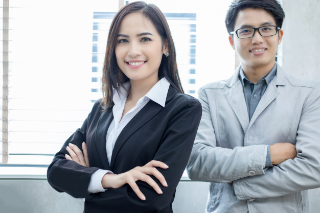 Man and woman smiling at the camera